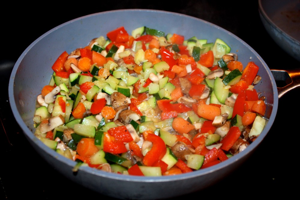 threw in red pepper, mushrooms + simmered in coconut oil